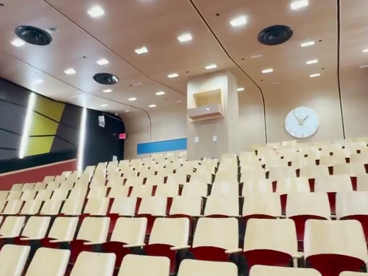 Auditorium seating and the rear projection installation.