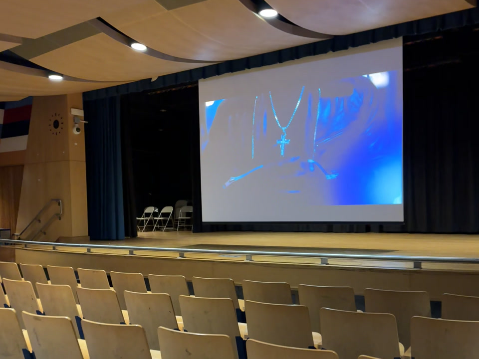 KAPPA III auditorium seating, stage and operating projection screen.